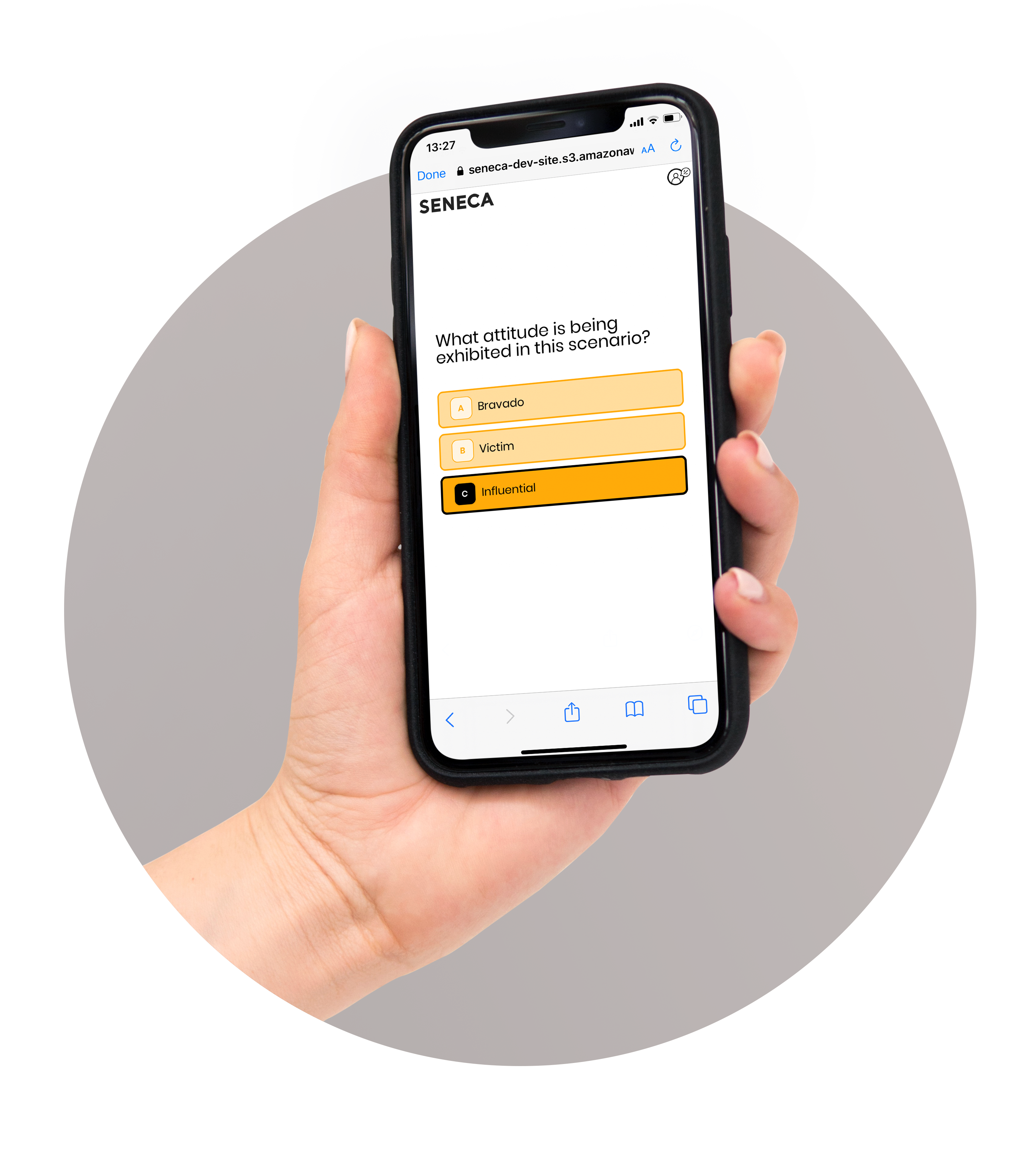 Hand holding phone display Seneca app Hand holding phone display Seneca app